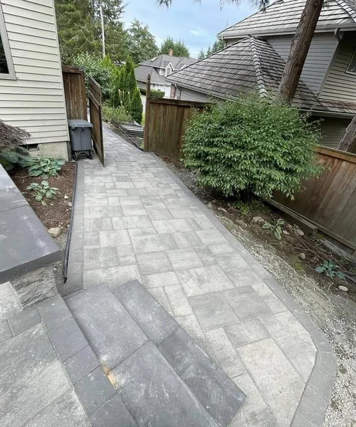 Installation of pavers. Retaining wall. Children's play area and installation of lights in Snohomish 